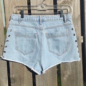 Faded denim Studded shorts